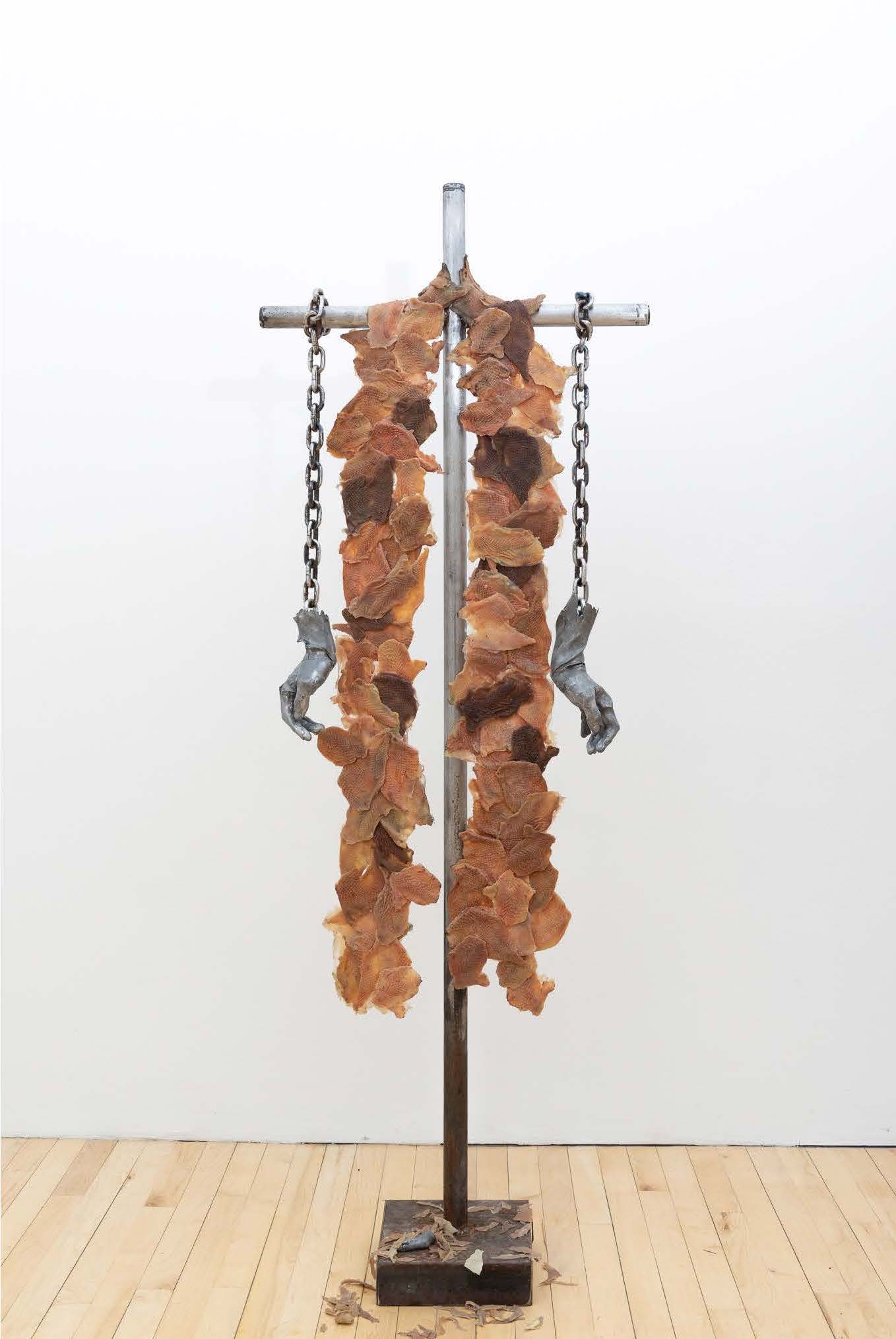 hanging chicken skins and hands