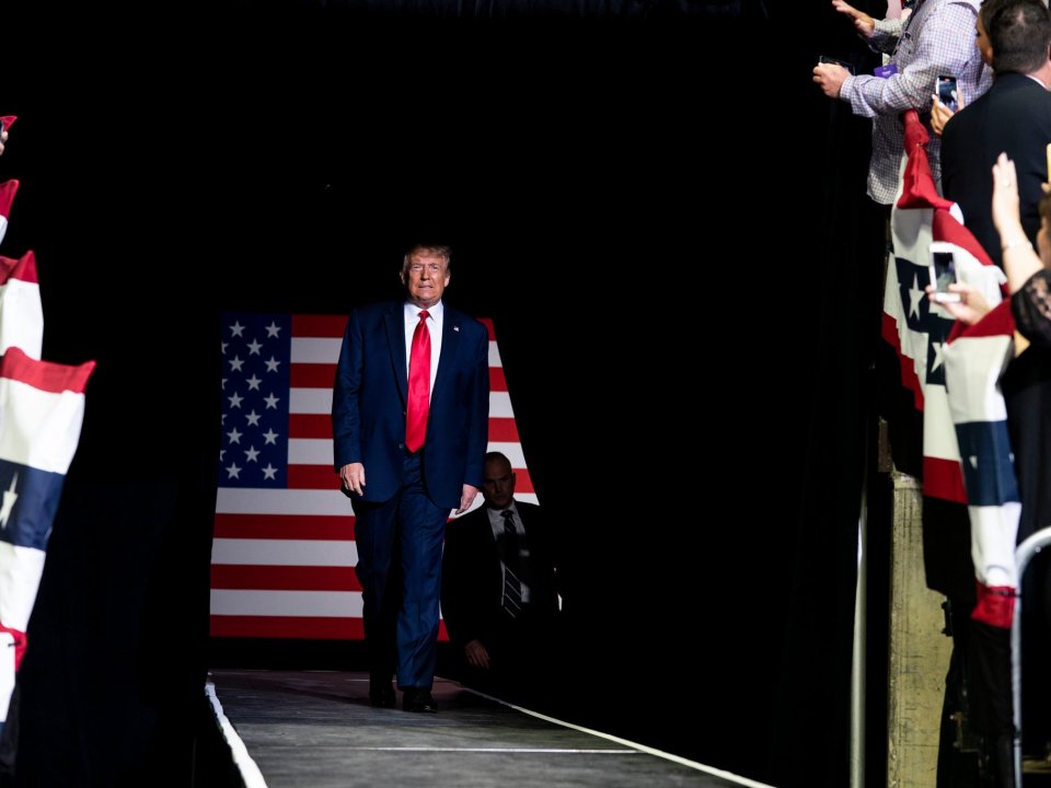 President Donald Trump walking on stage